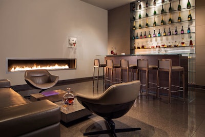 A small space inside Restaurant Guy Savoy at Caesars Palace, the cognac lounge is perfect for small-group events. Composed of little more seating than a couch, oversize chairs, and barstools, as many as 10 guests can sit around the fireplace and taste from 33 rotating cognacs, edited by sommelier Phil Park.