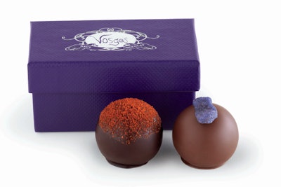 Vosges Haut-Chocolat‘s truffle favor comes with two confections presented in a white customizable or plain purple box. Plus, the company offers expert chocolate concierges to help with your order. Orders can be shipped throughout the United States and Canada.