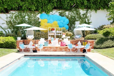 Guests learned about Target's latest sun-protection offerings at a poolside station that featured a colorful backdrop of parasols.