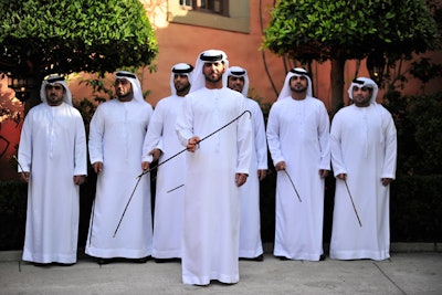 Classical Arabian Ayala dancers welcomed guests as they arrived to the Etihad Airways event's lavish residential venue.