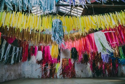 Add a pop of color and movement to events, festivals, and other gatherings with easy-to-install streamers from the Color Condition. The Dallas-based artists, known for their temporary installations using multicolored streamers in varying lengths and widths, collaborated with Brooklyn design and rental resource Patina for their latest collection. The decorations are available for rent nationwide in a mix of panels, baskets, or canopies through Patina.