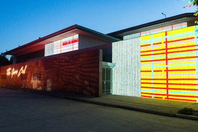 Bold and colorful projections from the Washington National Opera's recent production of The Magic Flute, designed by Japanese-American artist Jun Kaneko, covered the façade of the residence of the Japanese ambassador.