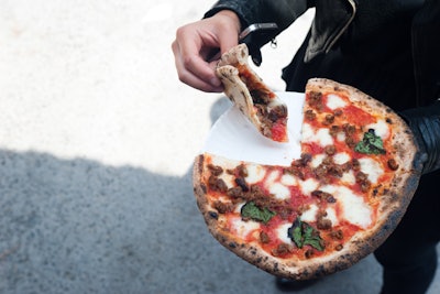 Bestia offers rustic Tuscan cuisine, such as Neapolitan pizza and porchetta, in Toronto. The truck caters events for as many as 300 people.