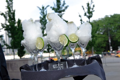 As guests arrived, servers handed out cocktails called the 'Magritte-Ahh.' The drinks combined cotton-candy clouds with tequila, agave, and lime-kaffir salt.
