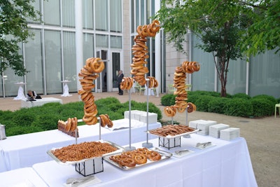 Chef Tony Mantuano and his team at Bon Appetit Catering, the museum's in-house firm, created a playful menu that nodded to Magritte's Belgian roots. At one station, guests could top their own baked pretzels with honey, cheese, and whole-grain mustard.