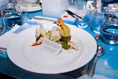 Playing off the famous Magritte quotation 'Ceci n'est pas une pipe' (or, 'This is not a pipe'), the first course came with a sign that read, 'This is Not a Soup.' The dish contained king crab, lobster tail, cauliflower, baby zucchini, squash blossom, sweet corn, and lobster essence.