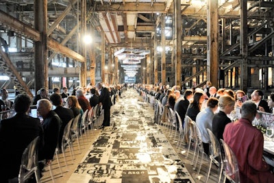 Guests of the Big Bang Bash had dinner at long communal tables.