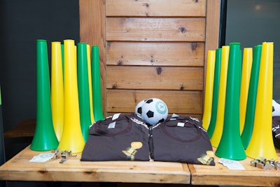 Guests at the Ardbeg Scotch tasting could try out a vuvuzela—the ubiquitous horn-like instrument from the 2010 World Cup in South Africa which is banned from this year's tournament. Monogrammed soccer balls, T-shirts, and soccer scarves also were among the giveaways.