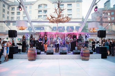 Antler chandeliers decorated the welcome party, which was hosted by the Beaver Creek Resort Company and planned by Emily Campbell of Bella Design. The opening-night band from Elan Artists featured dueling female fiddlers performing on top of bourbon barrels.