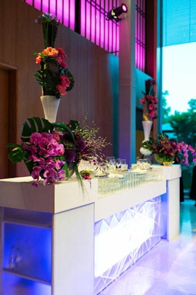 Bars set up throughout the residence were topped with flowers designed in the traditional Japanese Ikebana style.