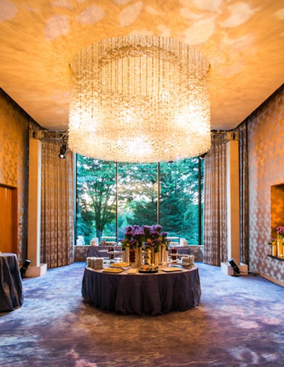 The lighting design created patterns on the walls and ceiling of the room where the grand dessert buffet was served.