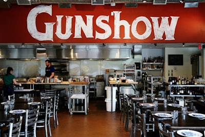 For those willing to experiment, Gunshow is chef Kevin Gillespie's ambitious eatery that's anything but stuffy. The spare, 2,500-square-foot space is designed to put guests in the kitchen, and the ordering process involves chefs bringing plates to diners dim-sum-style. Gunshow has 60 seats; a 10-seat bar area faces the chef's counter.