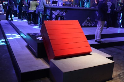 The conference had custom furniture designed to give people a place to perch but also facilitate conversations. Overall, there were fewer chairs than people, so 'they're connecting whether they like it or not,' joked St-Pierre.