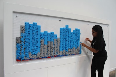 An installation called 'Pulse' from the toy company Mega Blok showed the volume and type of tweets for each hour of the conference. Blue represented Twitter, the most-used social platform.