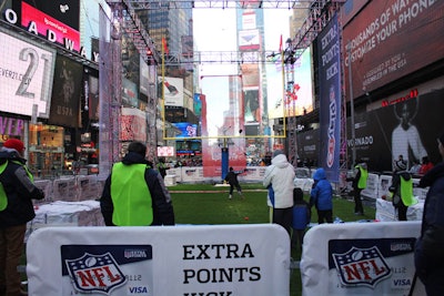 The fan fest at Super Bowl Boulevard in New York brought activities to busy parts of Manhattan, like football kicking in Times Square.