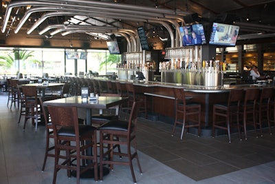 Yard House, a national chain of casual restaurants, opened its first Orlando location in April at I-Drive 360. The 14,000-square-foot restaurant seats nearly 400 people inside and an additional 80 on a patio for casual entertaining. The menu includes shareable snacks and appetizers, burgers, steaks, and seafood, and the chain’s signature feature: 140 beers on tap, including several from Florida breweries.