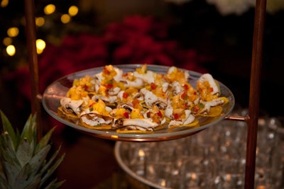 Brazil-theme appetizers from Calihan Catering at a 2011 benefit for the Woman's Board of the Chicago Horticultural Society included jerk chicken on plantain chips with mango salsa. The event was held at the Chicago Botanic Garden.