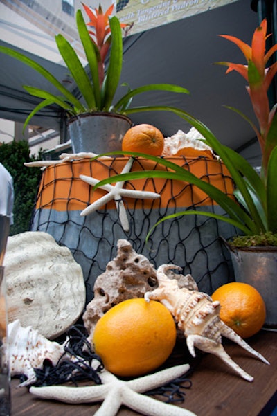 Many of the chefs' tasting stations featured playful beach decor, like the seashells, starfish, and fishing nets at Bobby Flay's table.