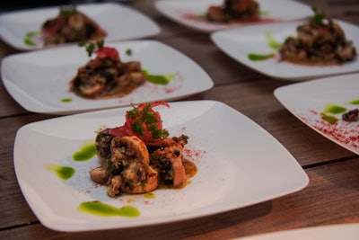 Octopus salad with tangerine, smoked paprika, and blistered Padrón pepper was offered at Bobby Flay's station.