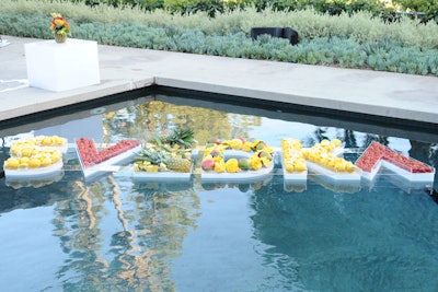 Fresh fruit decorated a hard-to-miss Svedka vodka logo that floated in a pool.