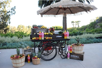 Colorful fruit arrangements adorned carts that served as drink stations.
