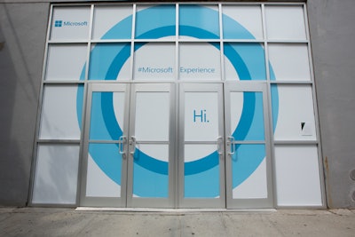 Every stage of the event experience was designed to feel personal and humanize technology. That included the door, which was marked with 'Hi' on the entrance side and 'Bye' on the other. Microsoft also made sure the night's hashtag, #MicrosoftExperience, was clear by placing it on signage as well as other items such as the napkins.