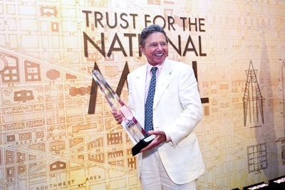 Trust for the National Mall chairman Chip Akridge was honored for his work founding the organization; he received a glass replica of the Washington Monument.