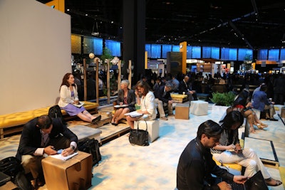 The 'downtown' networking area included a variety of gathering spaces. In addition to traditional leather seating cubes, organizers also brought in hundreds of cardboard cubes, which were strong enough to sit on but light and easy to move.