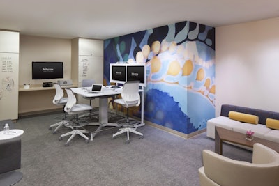 Westin's 'Tangent' spaces include central charging stations, multiple screens for presentations or videoconferencing, and Xboxes for playing DVDs or games.
