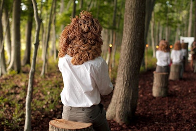 Nearing the end of the art forest was Mette Sterre's 'Hummelmania' piece. Four “typists” wore headpieces made of thousands of rubber bands while a fully rubber-band-enshrouded figure moved opposite them. Those seated pretended to type along to a melodic soundtrack of keys against a typewriter.