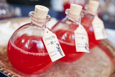 New sponsor Celebrity Cruises served the red 'Drink Me' cocktail—made from Patron tequila, ginger beer, and lime and boysenberry juices—in potion bottles with cork stoppers.