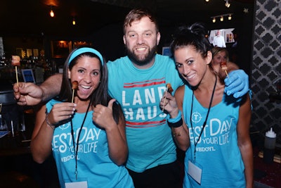 Guests wore Thrillist T-shirts at the 'Sweet & Intense' lounge at Bar13 hosted by hard cider brand Johnny Appleseed, which served chili pepper candy apples.