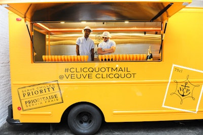 At the top of the ramp inside Industria Superstudio sat a Veuve Clicquot truck that doubled as a champagne bar. The event served as the launch of the Veuve Clicquot mail truck's summer tour.