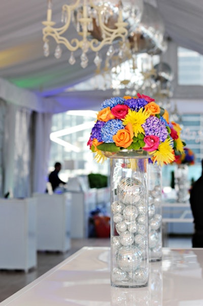 Flower vases were filled with miniature disco balls.