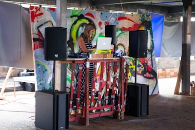 DJ Alex Merrell spun tunes from a reclaimed wood booth.