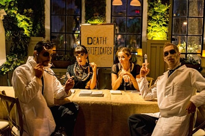 Performance artists manning different stations throughout the venue sported ghoulish face makeup.