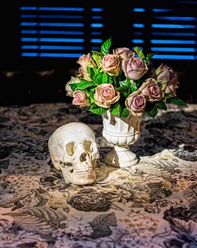 Skulls added edge to delicate metalina rose arrangements.