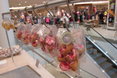 For a grab-and-go option that eliminated the need for servers, Grand Performances hung bags of doughnuts from hooks at Nordstrom's grand-opening gala.