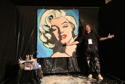 Gregory Adamson's live painting brought extra glitz and glamour to the trade show floor.