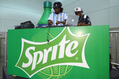 A DJ spun tunes from behind a customized booth at the celebrity basketball game sponsored by Sprite.