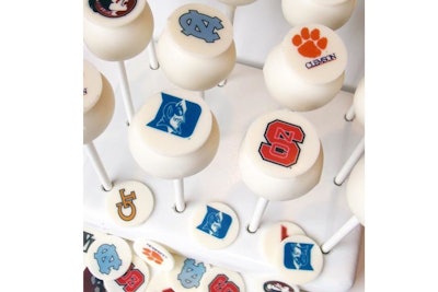 Butter cream cake pops with edible printed logo
