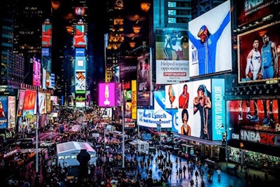 A night time view of the Show Your Color campaign