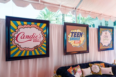 YourBash incorporated the show and sponsors' brands in the form of framed logos decorated with the art featured on the surfboard award.