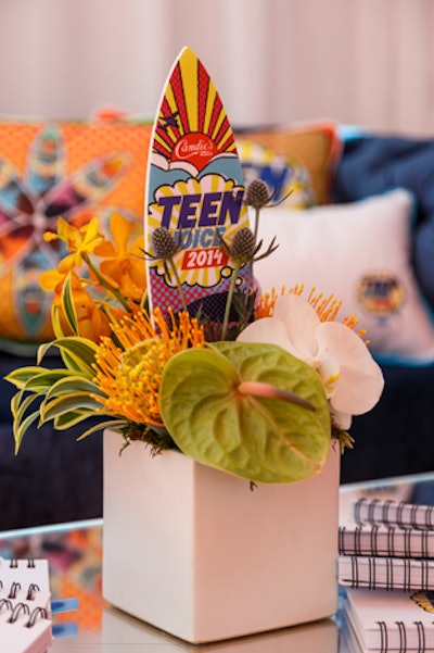 Mini Teen Choice Awards surfboards adorned floral arrangements.