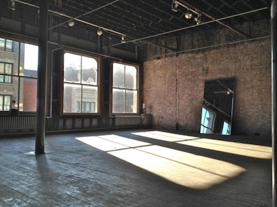 Exposed brick wall with amazing natural daylight both east and west