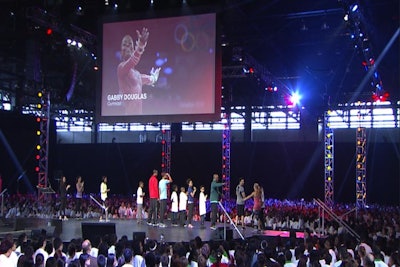 On the 360° stage, Nike athletes like Gabby Douglas are introduced while surrounded by kids