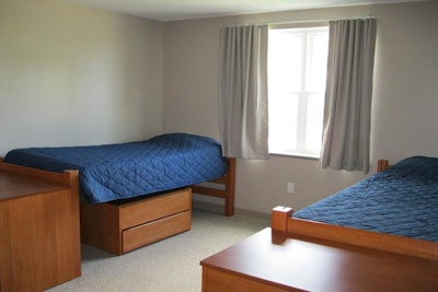 Dorm Room - Residential living space as well as facility space is fully available during the summer (May – August)