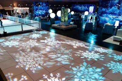 Pattern wash of icy blue snowflakes on floor at Santa Clara Convention Center in California