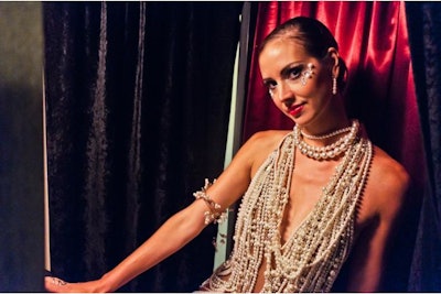 Flapper girl in a pearl dress at Urban Daddy's Twenties Throwback Party