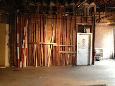 Raw industrial background, dark hard wood floors